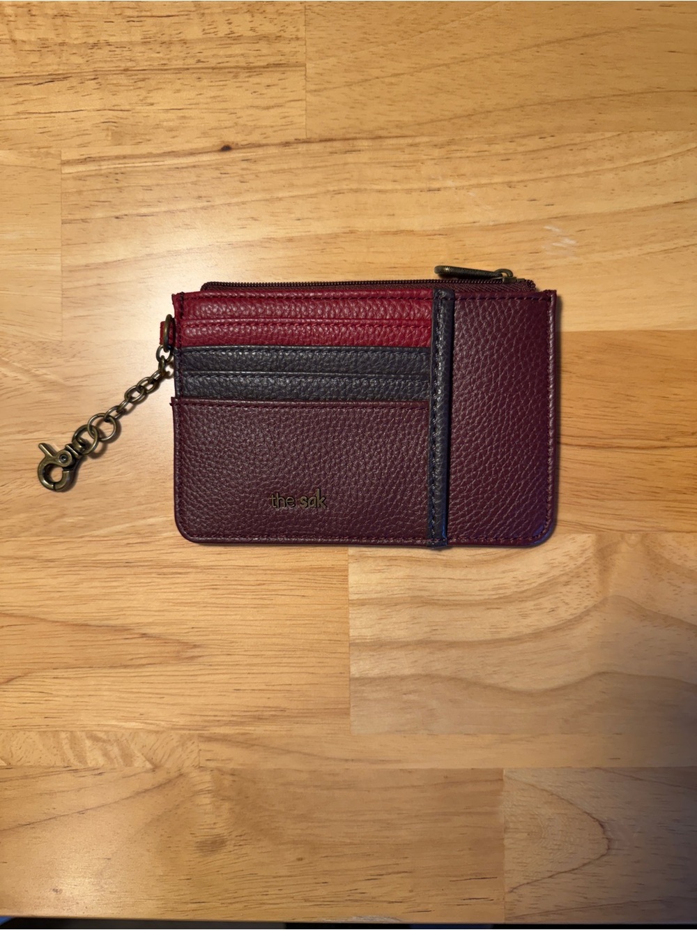 The Sak Burgundy Pebbled Zip Card Wallet with Keychain